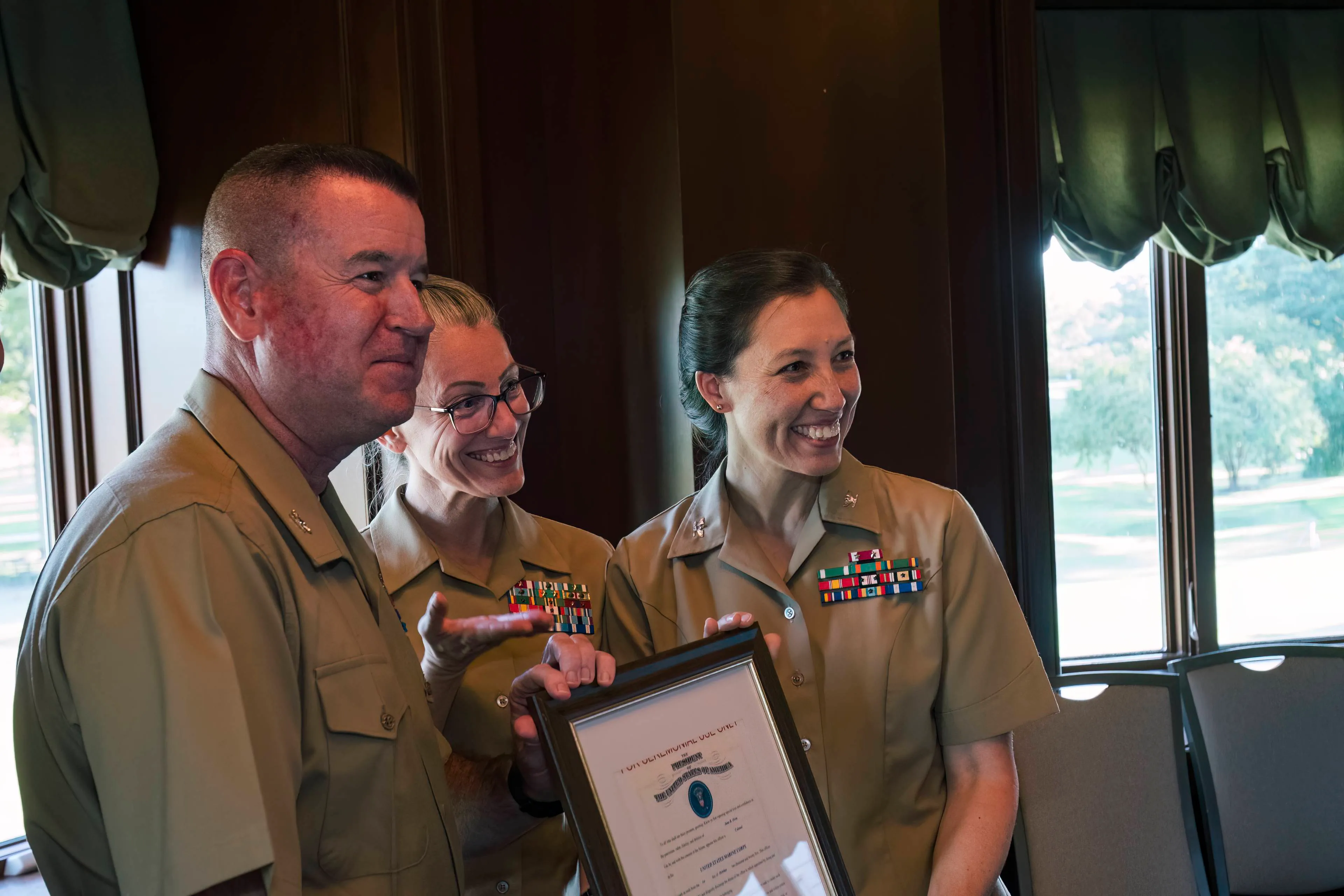 Military officers celebrating a promotion ceremony photographed at an event in the Washington, DC area.